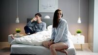 Worried Woman In Bed