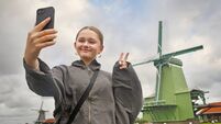 Tourist at windmills in Zaanse Schans