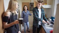 student flatmates in the kitchen