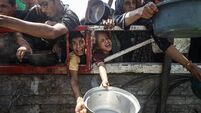 Charity distributes meals to Palestinians in Gaza facing food shortages under Israeli blockade