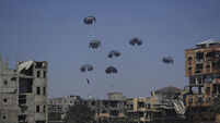 Watch: Relief packages air-dropped to civilians in Gaza