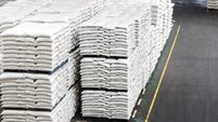 Animal feed bag food pallet system stacking in smart industry warehouse factory. Agricultural concept.