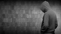 Computer hacker silhouette of hooded man