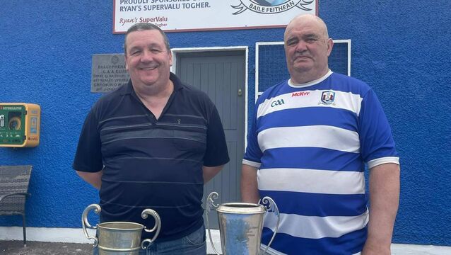 <p>ON THE RISE: Ballyphehane GAA's Paul McCarthy and Timmy Walsh with the Confined JBFC trophy and the Terence McSwiney Cup trophy.</p>