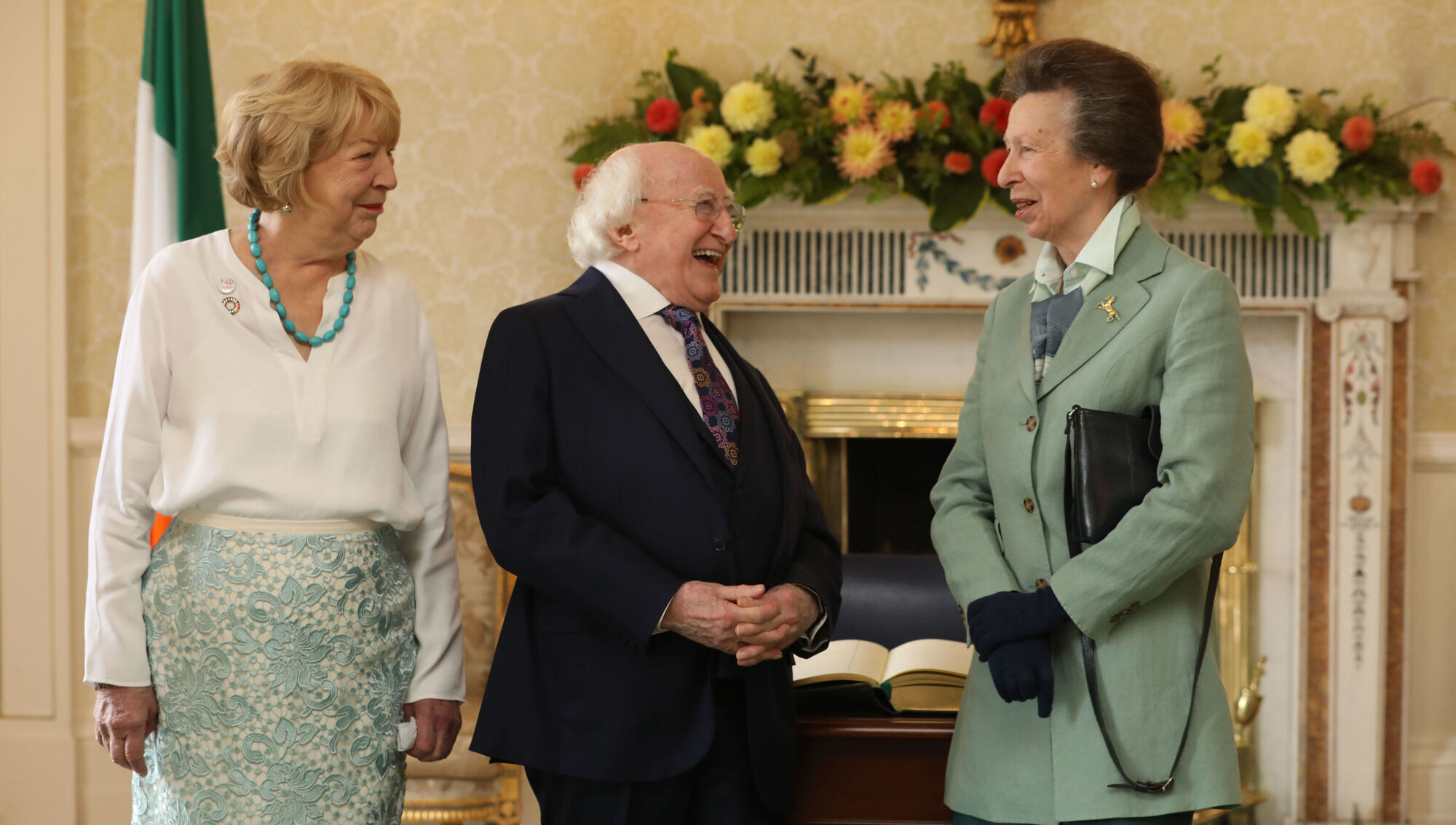 Feline fine: President Michael D Higgins hosts Britain's Princess Anne — and a cat — at Áras
